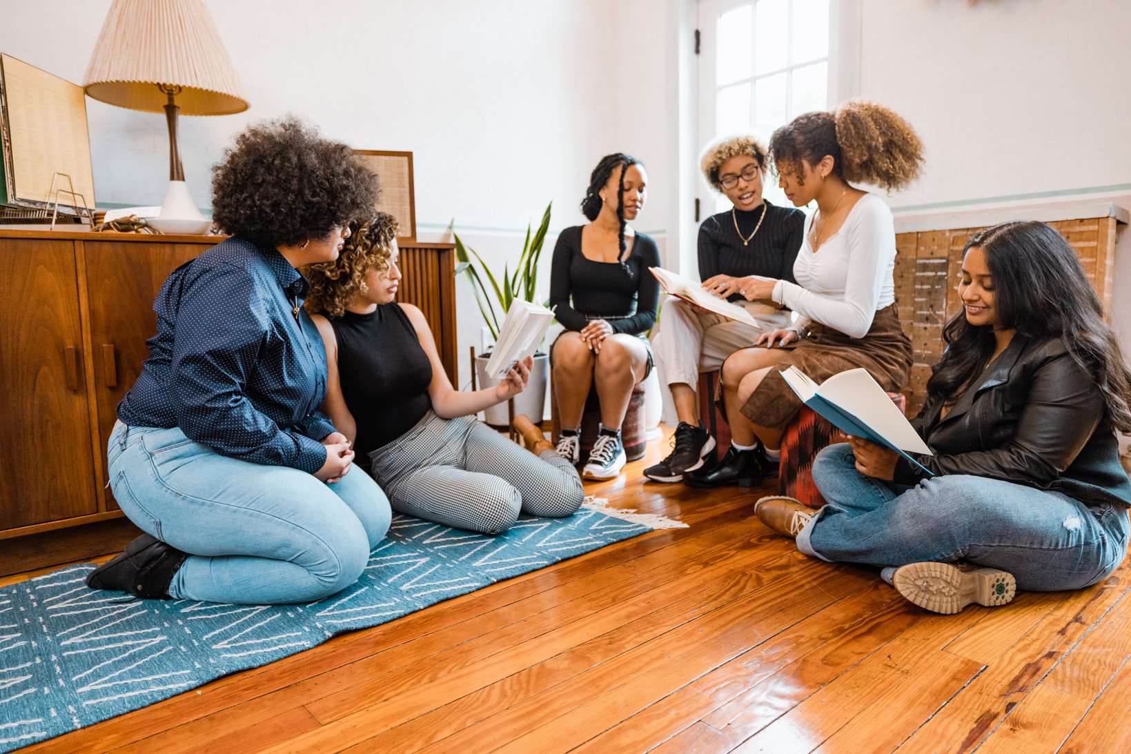 Book club, group of young students reading together