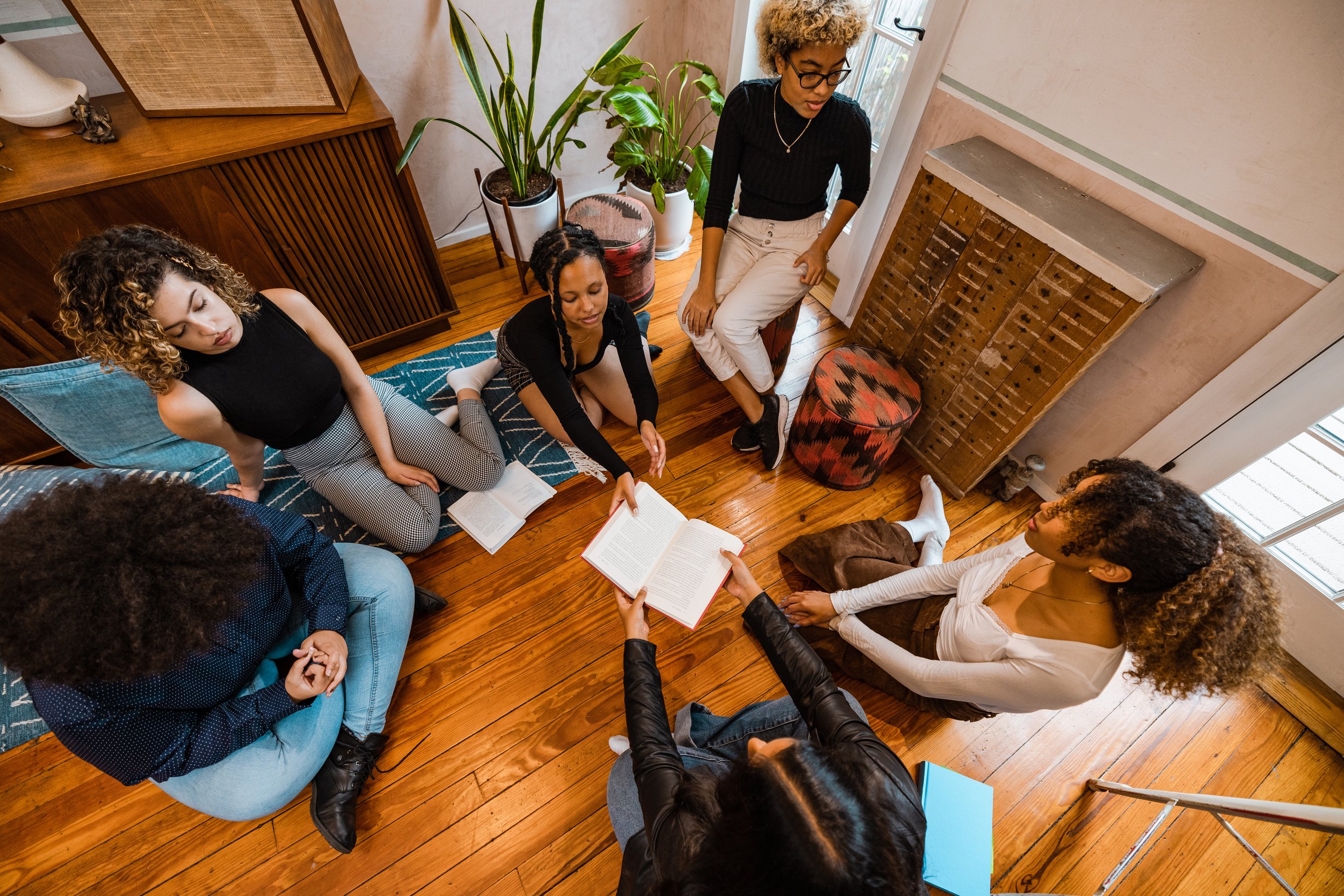 Book club, group of young students reading together